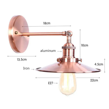 Copper-finished industrial vintage wall sconce with brass iron base and aluminum arm featuring exposed edison bulb for bedroom decorbites industrial vintage design