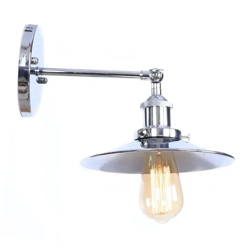 Chrome finished industrial vintage wall sconce with wide flat shade and vintage edison bulb decorbites industrial vintage wall