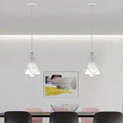 Two white wrought cage pendant lights with faceted design and frosted glass shades for living room decorbites industrial vintage