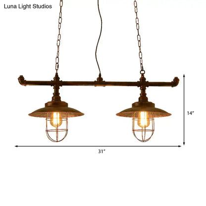 Industrial-style wire guard hanging light with weathered copper pipe design and two exposed bulbs with chain cord length