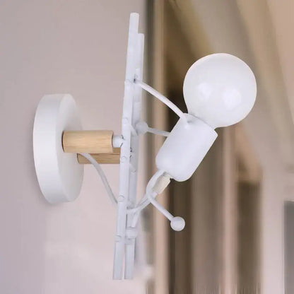 Industrial white and brass wall sconce with minimalist wooden stick figure design for decorbites industrial led lighting