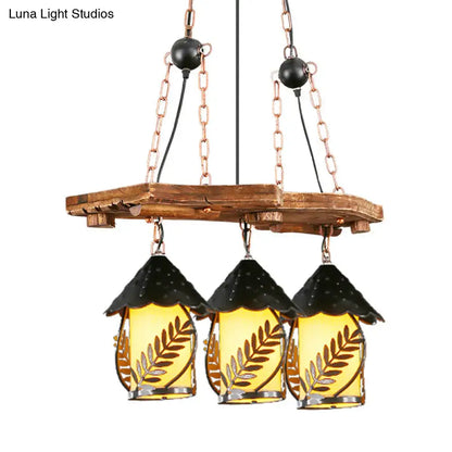 Rustic wooden chandelier with three amber glass lanterns and black metal roofs for industrial white clear lantern island lighting