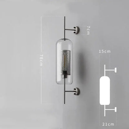 Modern minimalist black metal wall lamp with clear glass cylinder and perforated metal mesh interior decorbites industrial wind grid