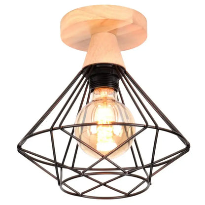Industrial wood ceiling chandelier featuring a black metal cage and natural wood mount with exposed edison bulb decorbites industrial wood ceiling decor