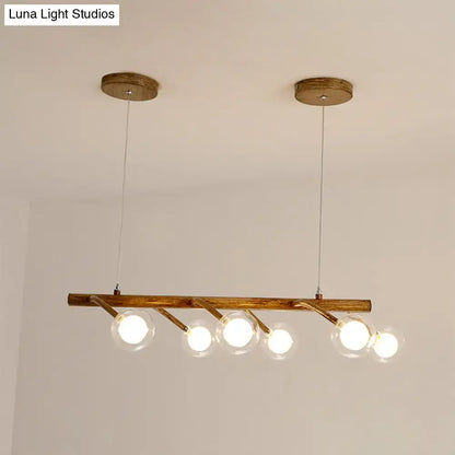 Decorbites industrial wooden chandelier with brass arms and modo clear glass shade for dining hall or island lighting