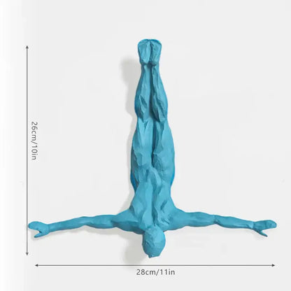 Blue textured bungee jumper wall sculpture of a person in inverted yoga pose for industrial living room decorbites decor