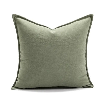 A square olive green ins wind matcha faux fur throw pillow with textured fabric and stitched edges for living room decor