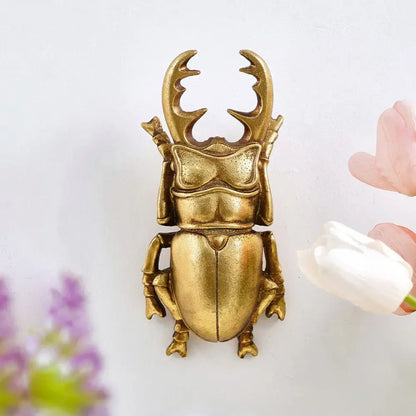 Intricate golden beetle resin wall decor featuring polished metallic finish and detailed beetle resin handicrafts design