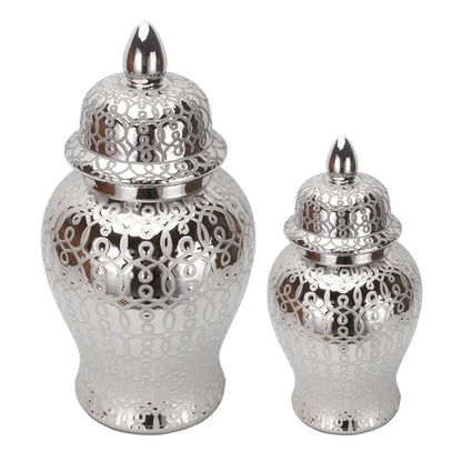 Silver ceramic jar vase with intricate lace-like cutouts and matching lids for elegant decorbites golden pattern decor