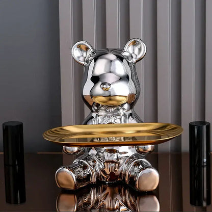 Shiny silver bear figurine holding a gold-trimmed tray for decorbites colorful bear storage box living room use