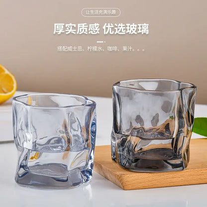 Two clear textured glass cups with modern faceted design from the decorbites iceberg glass tumbler set