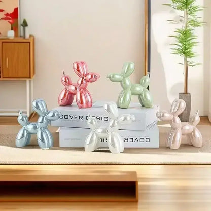 A set of five iridescent glossy balloon dog ceramic sculptures in pink mint green silver and light rose gold for decor