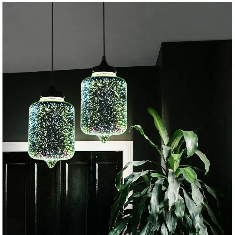 Two iridescent starburst glass pendant lights in green and blue for living room decor showcasing elegant glass pendant lights