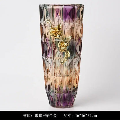 A tall crystal glass vase with purple and amber gradient and gold floral embellishments, ornate feet, dining room decor