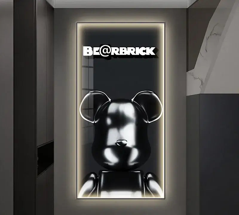 Black glossy bearbrick figure in metal frame illuminated as led wall lamp for bedroom decor
