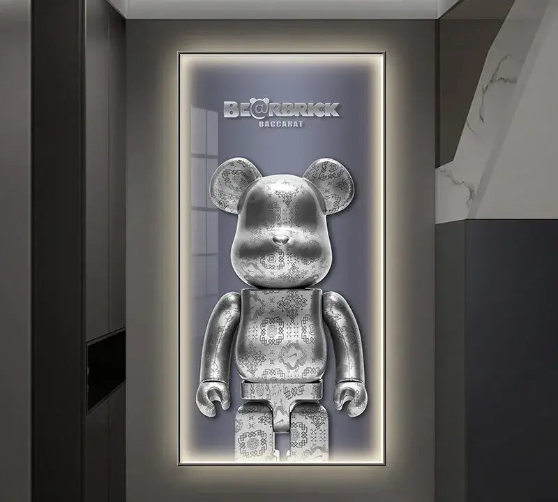 Silver metallic bearbrick led wall lamp with intricate black detailing in framed illuminated bedroom wall mount