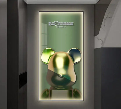 A sleek metallic gold and green bearbrick led wall lamp with glossy finish for bedroom decor illuminated frame