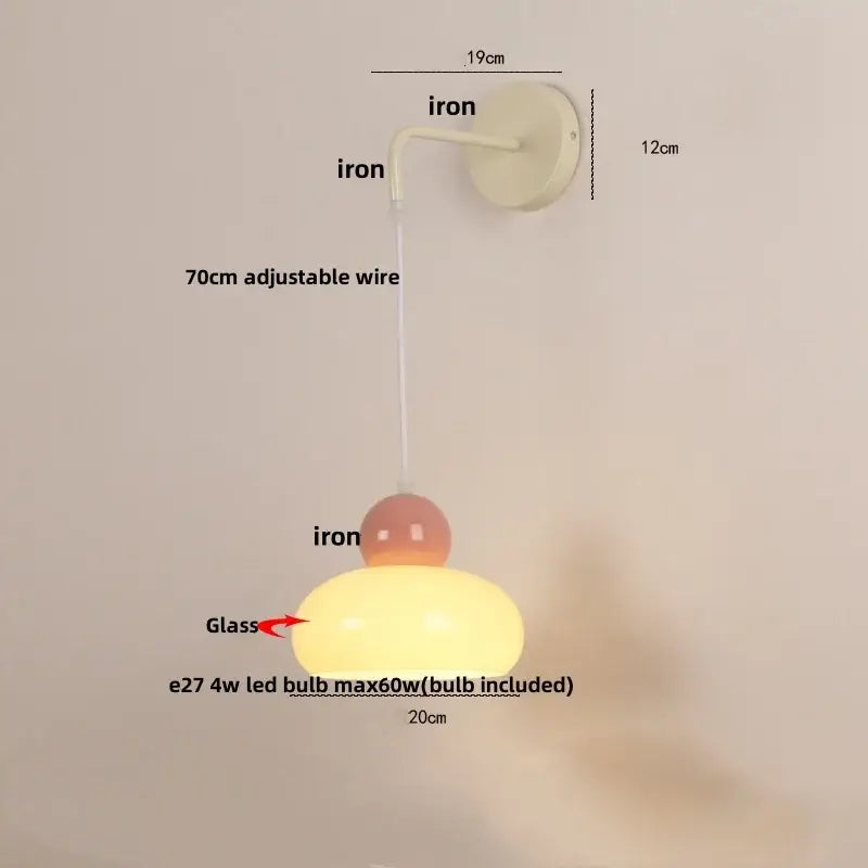 Cream-colored glass wall light with matte iron nordic led curved arm and adjustable 70cm wire by decorbites