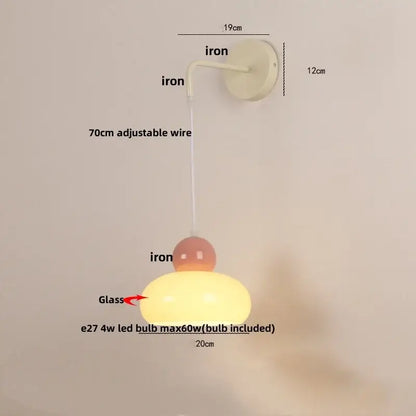 Cream-colored glass wall light with matte iron nordic led curved arm and adjustable 70cm wire by decorbites