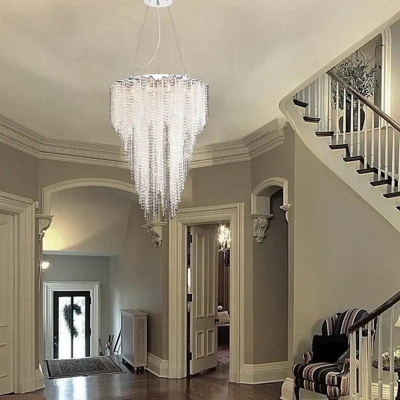 A cascading crystal tassel pendant light with a modern tiered design for bedroom decorbites crystal tassel chandelier