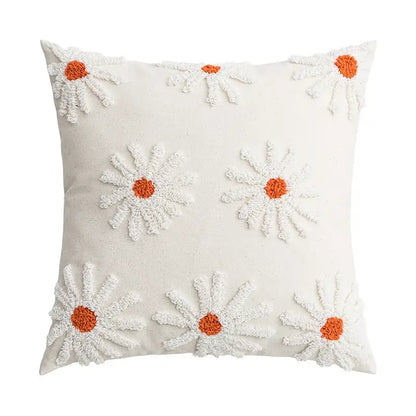 Ivory tufted cushion cover with embroidered white daisies and orange centers for living room decor by decorbites