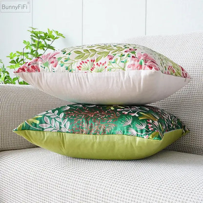 Two bunnyfifi jacquard floral pillow covers with pink green floral and white gold leaf designs for bedroom decor