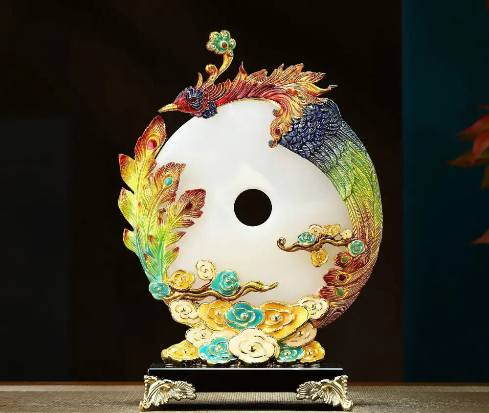 A vibrant white jade dragon phoenix ornament with colorful enamel accents on a decorative base for living room decor