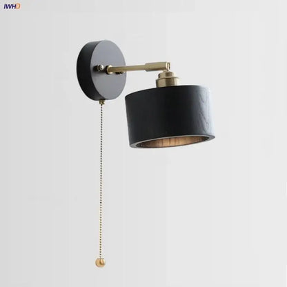 Japanese black wood wall light with matte black cylinder and brass accents featuring wooden interior for bedroom decorbites wall light