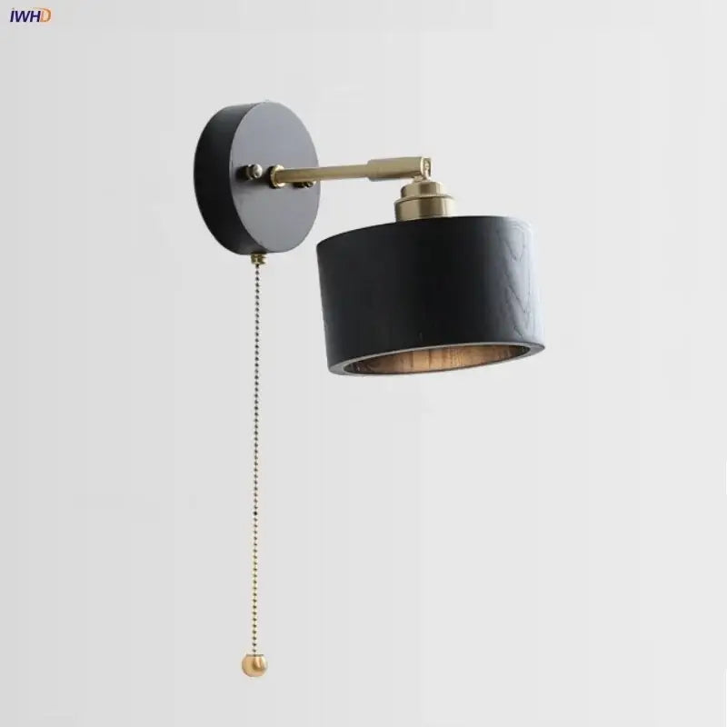 Japanese black wood wall light with matte black cylinder and brass accents featuring wooden interior for bedroom decorbites wall light