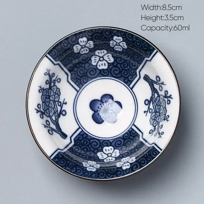 Traditional blue and white porcelain decorbites ceramic kung fu tea cup featuring intricate cherry blossoms and plum branches patterns
