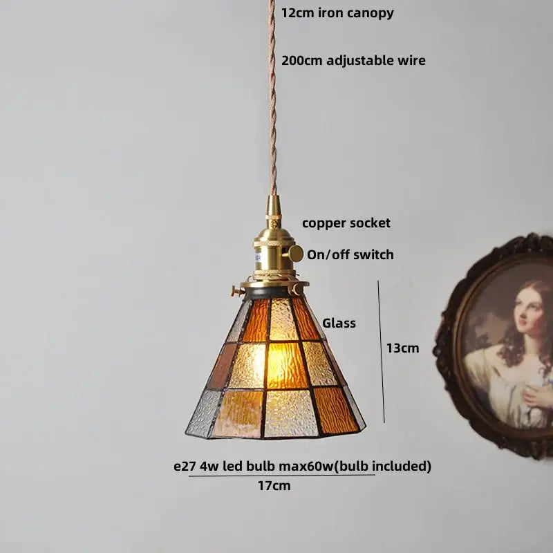 A warm-toned Japanese geometric glass led pendant lamp with brass-finished copper socket and adjustable suspension