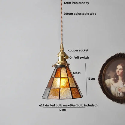 A warm-toned Japanese geometric glass led pendant lamp with brass-finished copper socket and adjustable suspension
