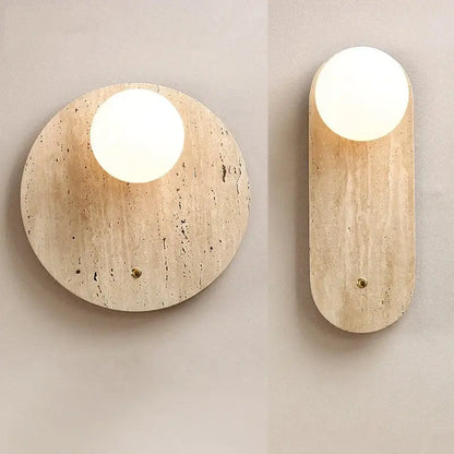 Japanese minimalist beige cave stone wall lamp with circular and oval design and soft white globe for bedroom decorbites cave stone wall