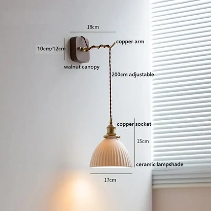 A warm-toned ceramic led wall light with vertical ridges and copper accents for bedroom decorbites ceramic led lighting