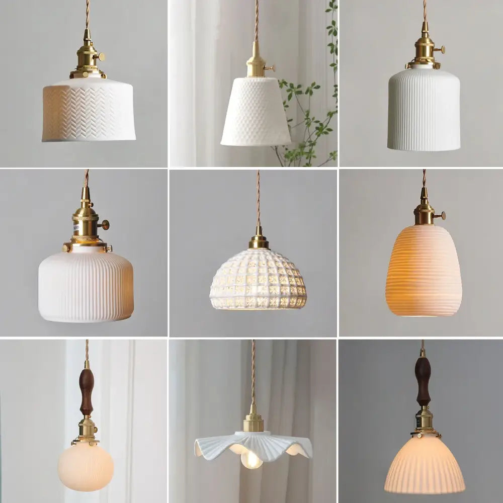 White ceramic pendant lights with brass fixtures featuring ribbed designs for kitchen and dining room use