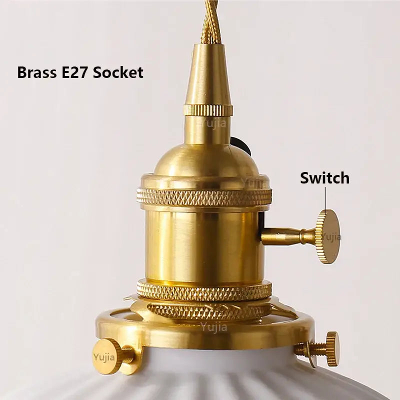 Gold-colored brass e27 light socket with knurled switch for japanese ribbed white ceramic pendant light in kitchen dining room