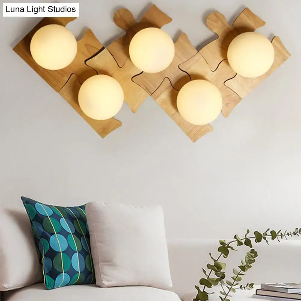 Japanese style beige wooden puzzle base wall light with three warm spherical light fixtures for corridor use