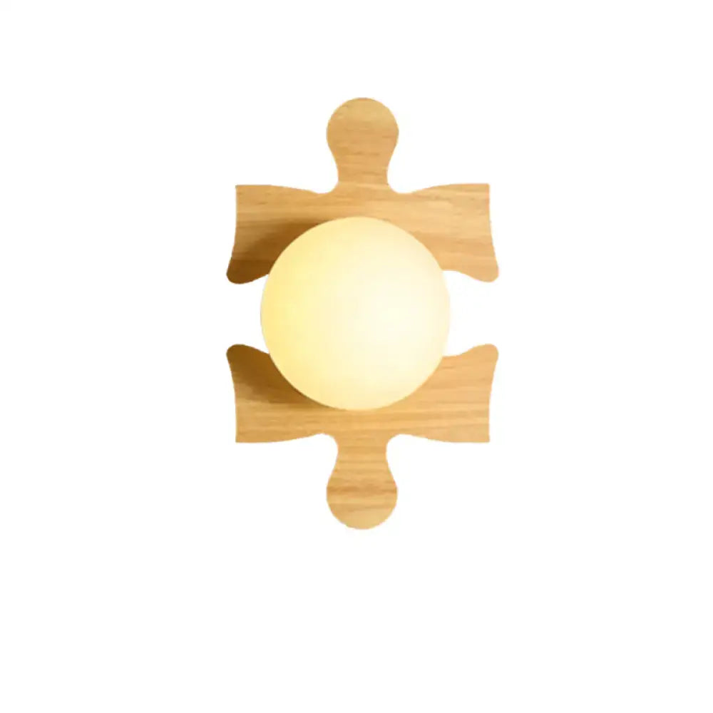A warm glowing spherical wall light with a beige wooden puzzle base in Japanese style for corridor use