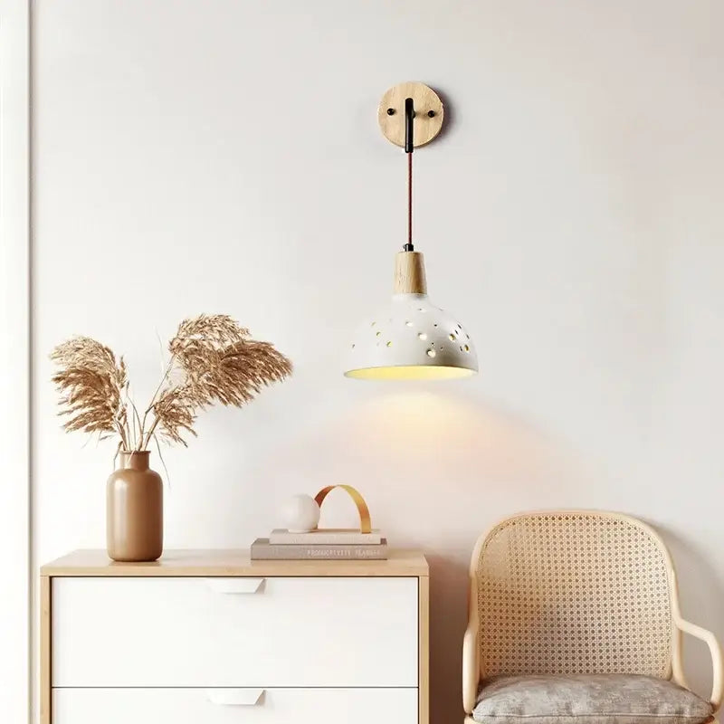 Minimalist white metal pendant wall light with perforated shade and natural wood accents from decorbites japanese style led collection