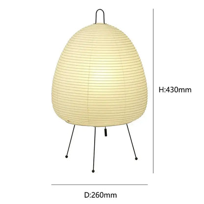 Cream-colored japanese style rice paper desk lamp with black metal tripod base and hanging loop for bedroom lighting