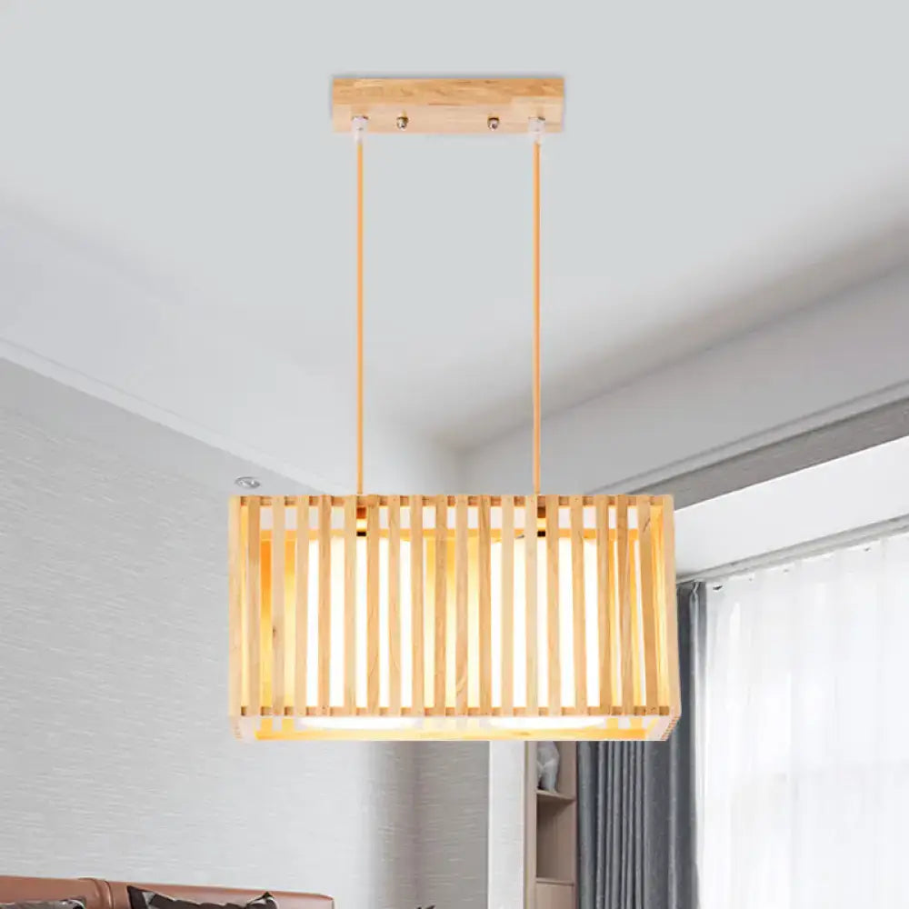 Rectangular rubber wood cuboid cage pendant light with vertical slats and warm finish for dining table lighting