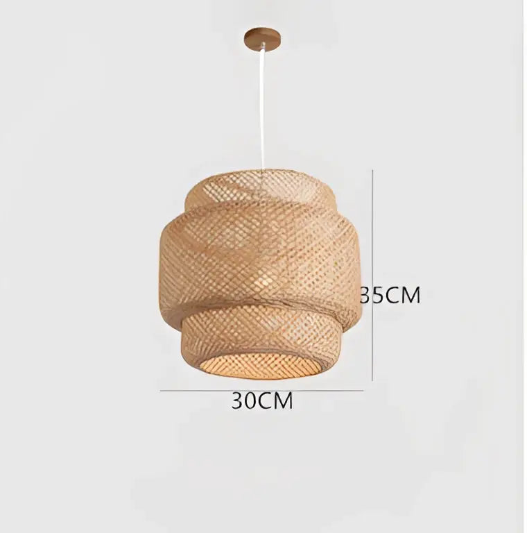 Natural woven rattan japanese style pendant light with tiered cylindrical layers and wooden ceiling mount for intimate spaces