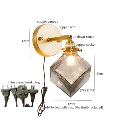 A vintage-style wall lamp with brass copper arm and faceted grey textured bell glass led shade decorbites bell glass