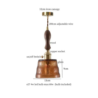 Japanese vintage amber glass led pendant lamp with dark wood handle and brass accents for dining room lighting