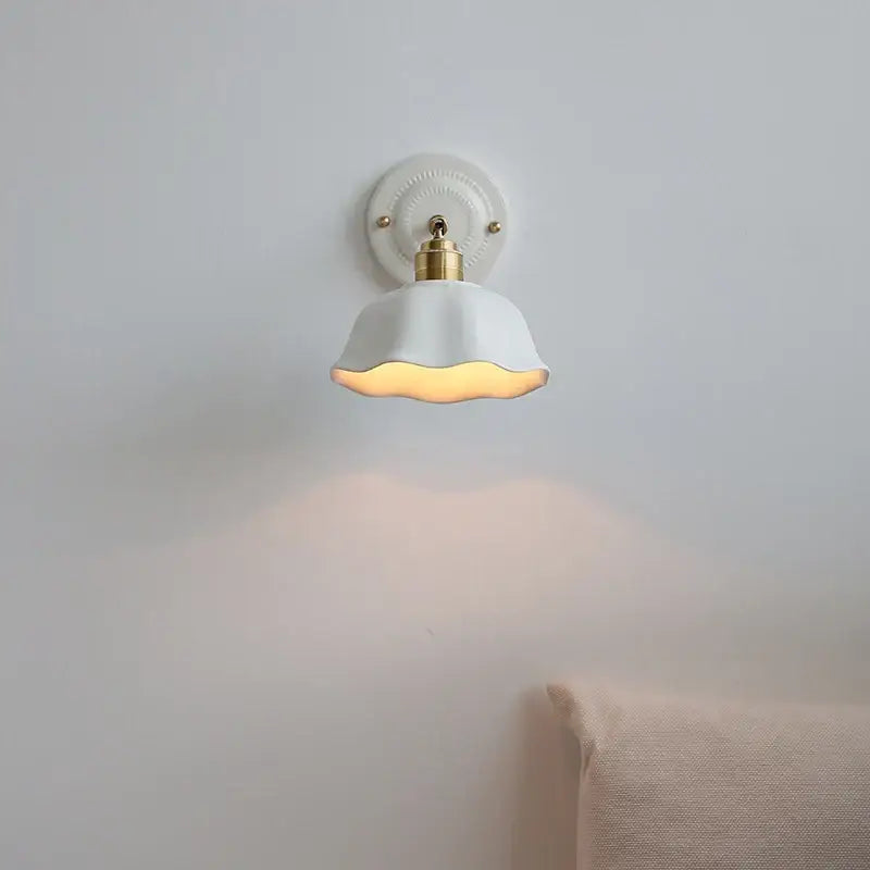 Japanese vintage white ceramic led wall sconce with brass accent and scalloped lampshade for bedroom decorbites ceramic led wall