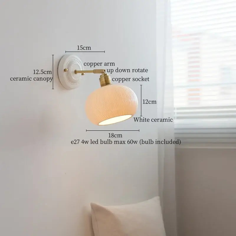 Japanese vintage white ceramic led wall sconce with copper arm and rotating up-down design for bedroom decorbites ceramic led wall