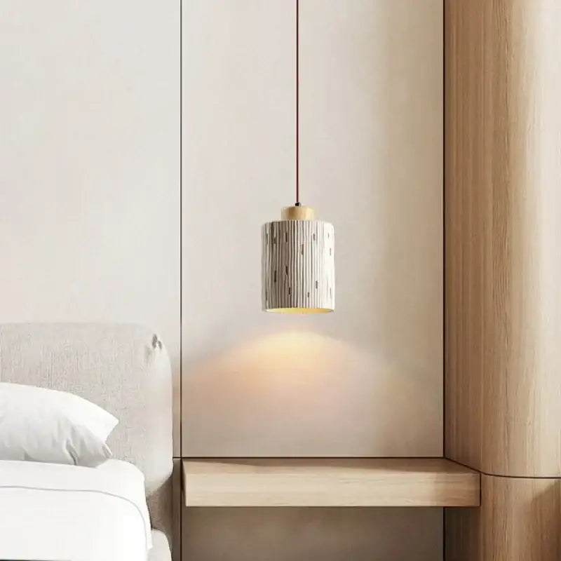 Cylindrical ceramic pendant light with vertical black lines and brass top for bedroom decorbites cement led pendant lights