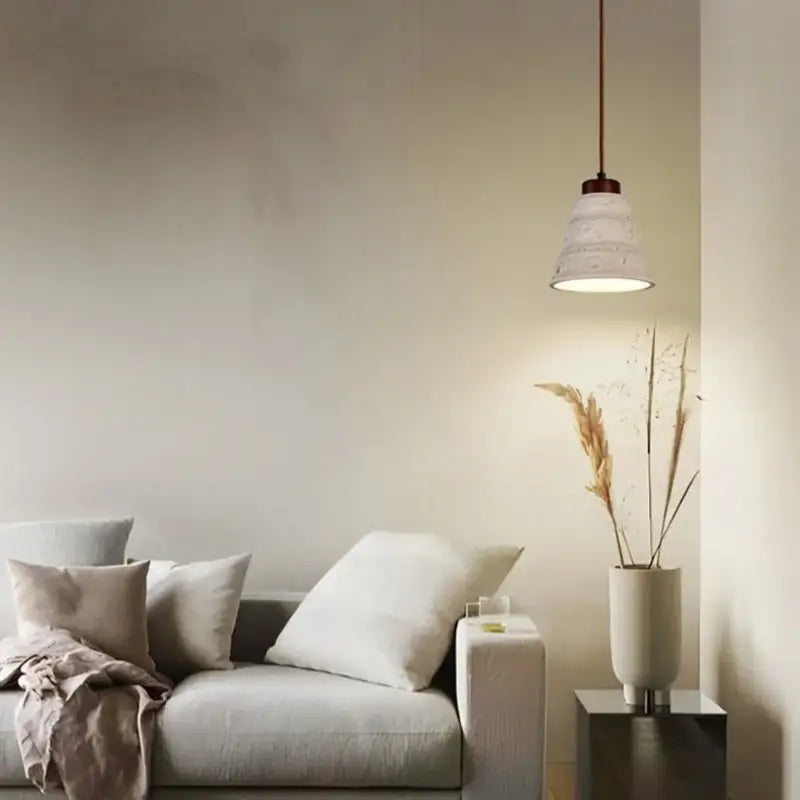 Minimalist white ceramic cement led pendant light with fluted design and warm metal cord for bedroom decorbites pendant lights
