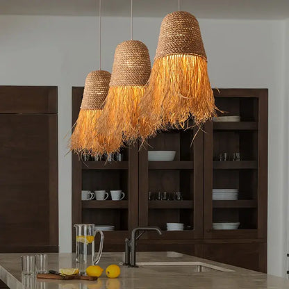 Three hanging decorbites handmade rattan pendant lights with natural-toned woven straw shades and fringe for living room decor