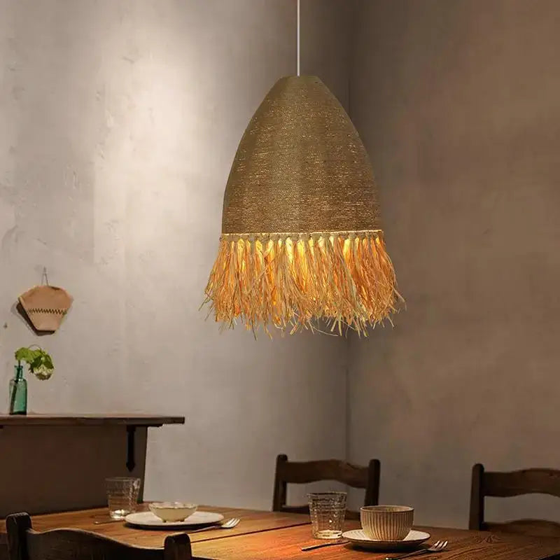 Japanese woven straw fringed pendant light in warm tones handmade rattan pendant perfect for living room decorbites design